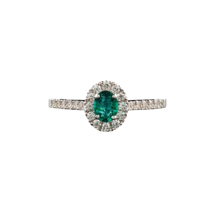 beautiful-white-gold-ring-with-diamonds-emerald-black-background