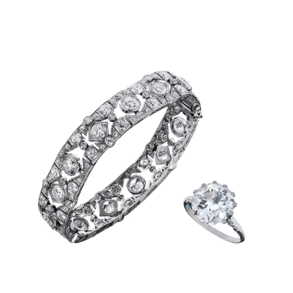 vertical-shot-beautiful-diamond-ring-bracelet-blue-background